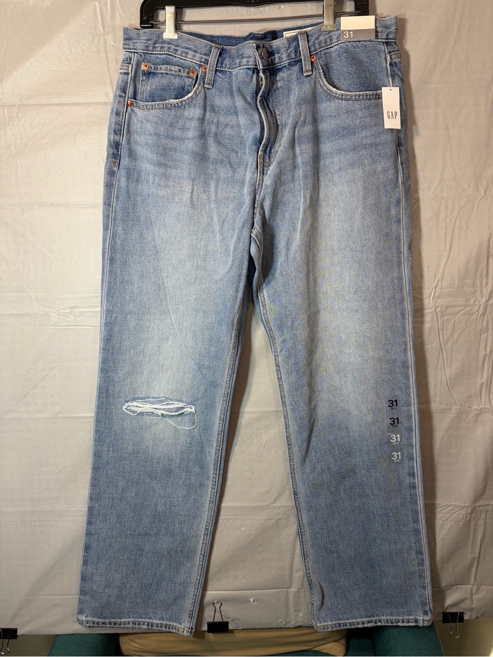 168. GAP Woman’s Light Wash Straight-Leg Jeans with Knee Rip